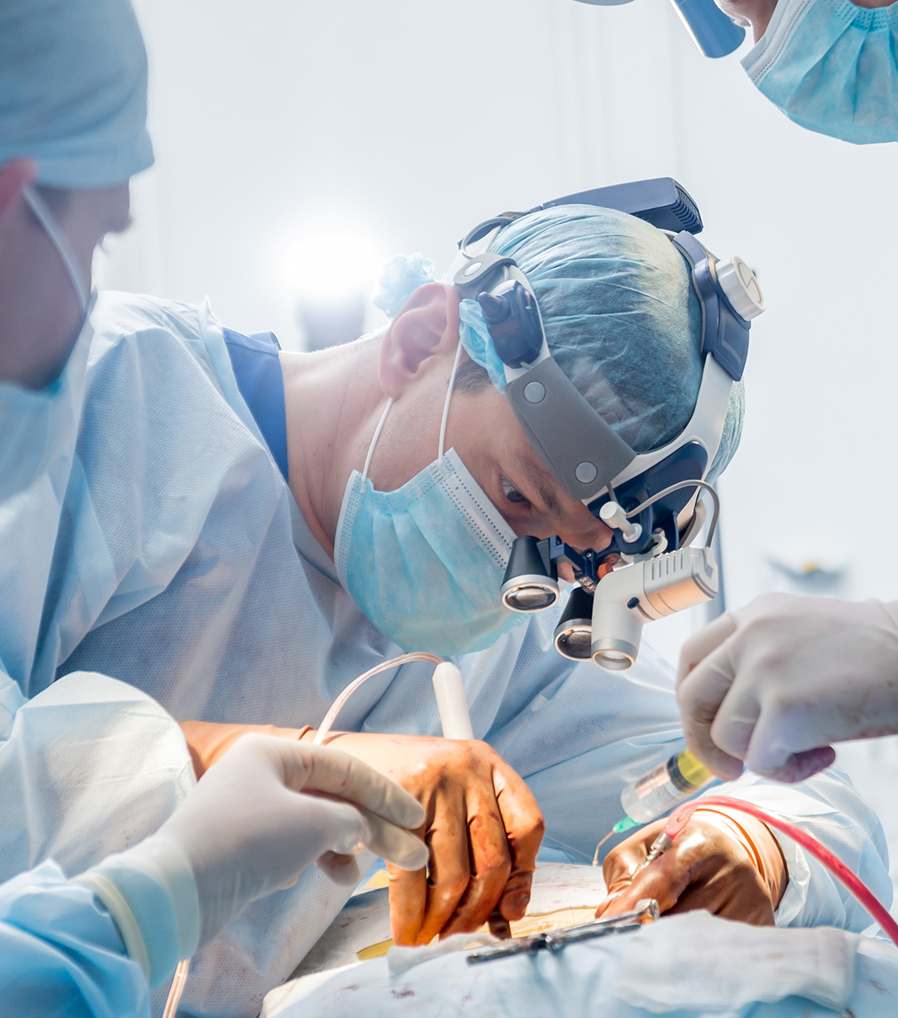A physician performing a percutaneous nephrolithotomy procedure to clear kidney stones