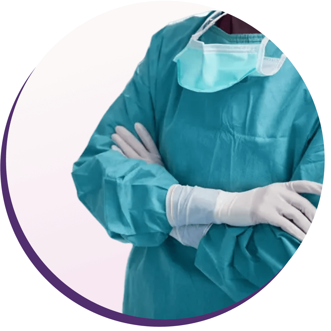 A physician in operating room scrubs preparing for a kidney stone procedure